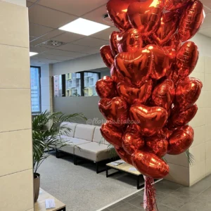 Букет из 50 красных воздушных шаров в форме сердца